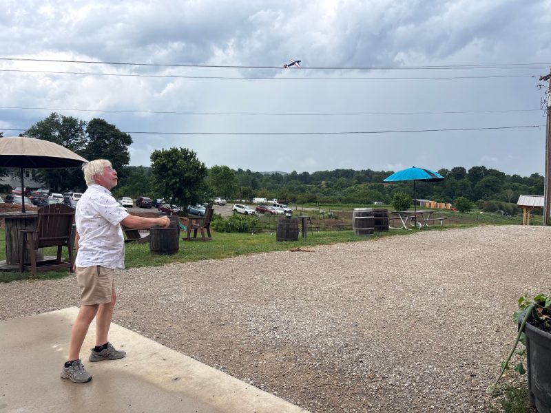 July SoT 4 A Styrofoam glider floats in the air shortly after being launched by a participant.