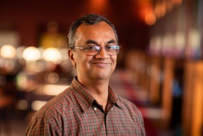 This photo shows computer science faculty member T. M. Murali. It is a head and shoulder shot. 